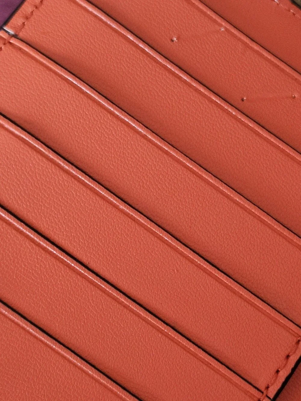 Kate Spade New York coral orange Saffiano leather continental wallet